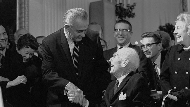 President Lyndon B. Johnson greets Upton Sinclair in December 1967. PictureL Lyndon Baines Johnson Library