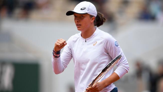 Poland's Iga Swiatek managed to escape a tricky match against China's Zheng Qinwen. Picture: AFP