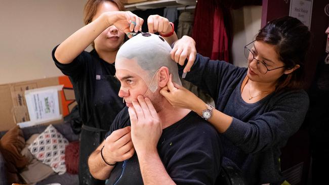 Meen Jung Shin helps Ben with his skull cap while Tracy Leong mic's him up. Picture: Mark Stewart