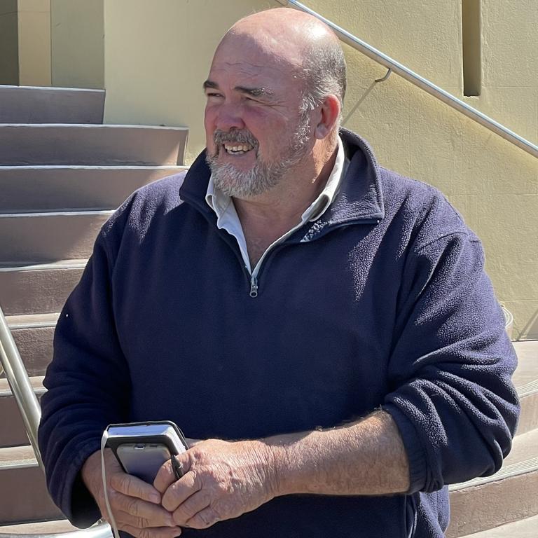 Former Origin great and Mackay Regional Councillor Marty Bella (right) leaves court after giving evidence in a committal hearing into an alleged attack on him in July 2021 at his Koumala property. Picture: Janessa Ekert