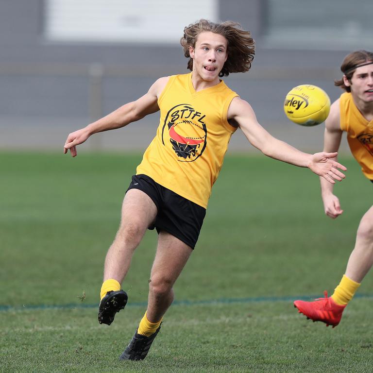 Under 16 Boys STJFL vs. NTJFA match, North Hobart Oval: South's Fergus Kenny kicks the ball forward. Picture: LUKE BOWDEN