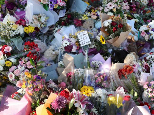 Flowers at the scene of the murder. Photographer: Liam Kidston