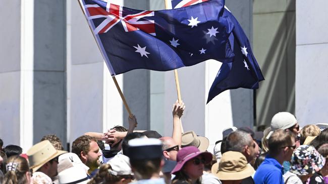 Large crowds during Their Majesties departure at the forecourt of Parliament House in Canberra on Monday. Picture: NewsWire / Martin Ollman