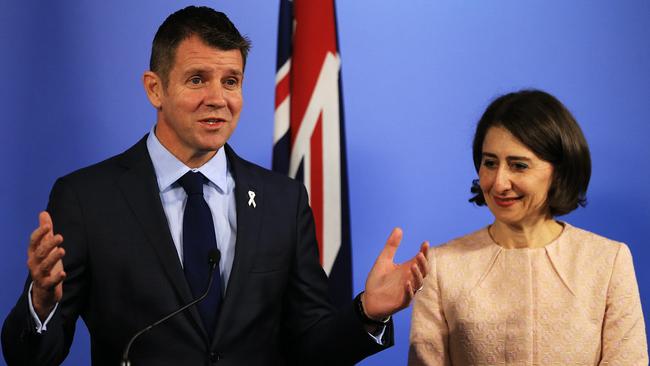 NSW Premier Mike Baird and Treasurer Gladys Berejiklian announce the successful consortium to win the lease of NSW TransGrid electricity network. Picture: Toby Zerna