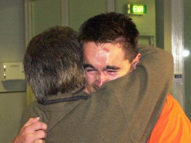 Bali bombings survivor Tim Weatherald returns home to Adelaide Airport in 2002.