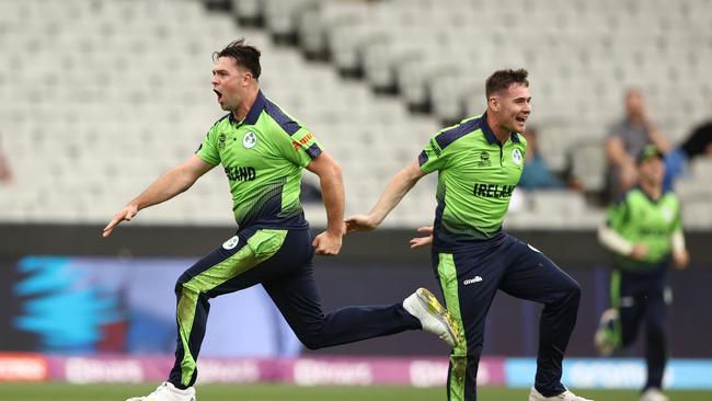 MELBOURNE, AUSTRALIA – OCTOBER 26: Fionn Hand of Ireland celebrates taking the wicket of Ben Stokes of England during the ICC Men's T20 World Cup match between England and Ireland at Melbourne Cricket Ground on October 26, 2022 in Melbourne, Australia. (Photo by Robert Cianflone/Getty Images)