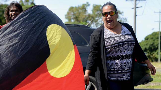 Kristen Pearson leads a protest outside Yarrabah Shire Council's offices. Picture: Isaac McCarthy