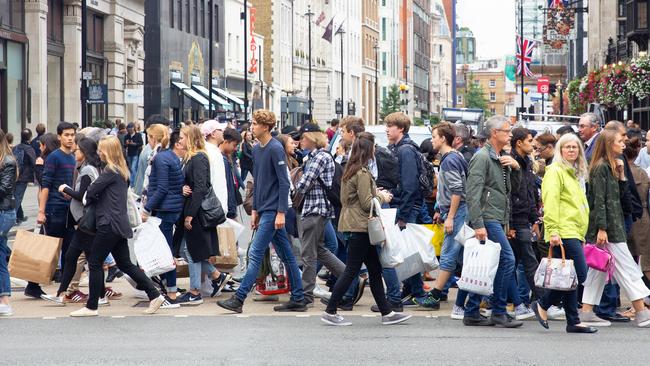 England London Oxford street pedestrians crossing street