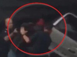 A man appears to charge at a police officer. Picture: 3AW