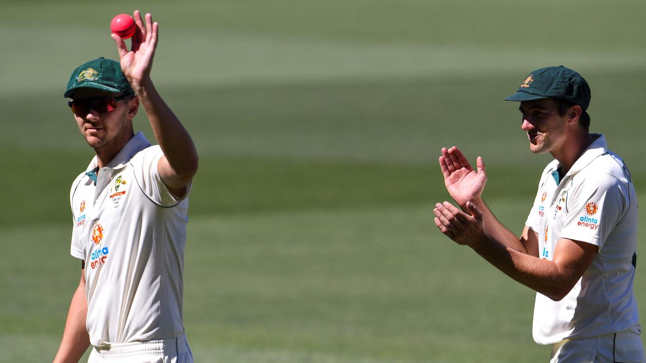 Pat Cummins showed his support for fellow paceman Josh Hazlewood after his brilliant five-wicket haul in Adelaide. Picture: AFP