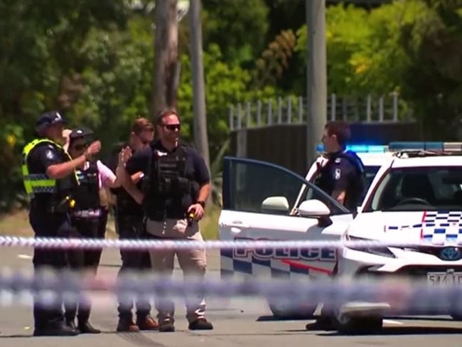 Queensland Police at the crime scene declared on Railway Parade on Sunday, December 23. Picture: 7News