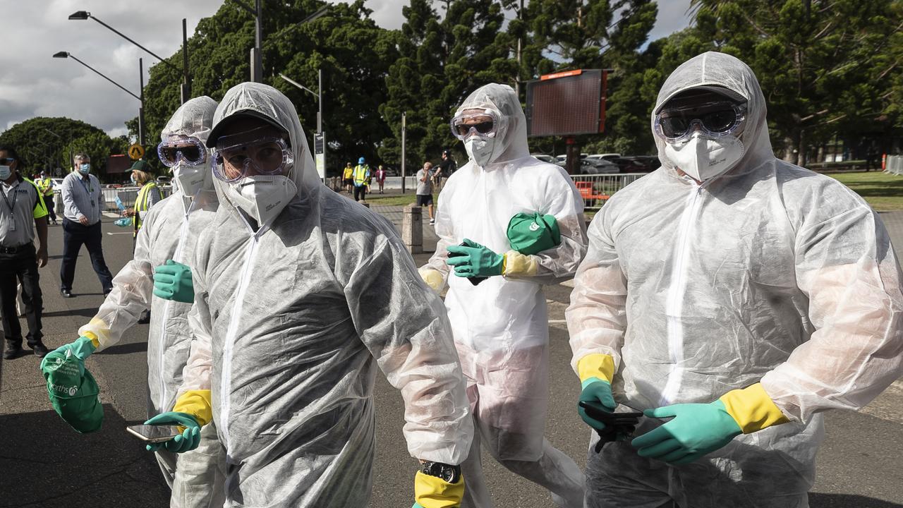 Cricket fans in COVID themed fancy dress arrive at the SCG for the first day of the Australia vs India Test on January 7. Picture: Brook Mitchell/Getty Images