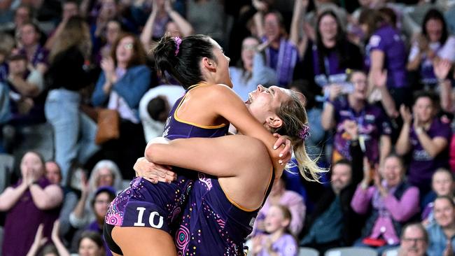 Donnell Wallam and Emily Moore of the Firebirds celebrate victory over the Melbourne Vixens. (Photo by Bradley Kanaris/Getty Images)