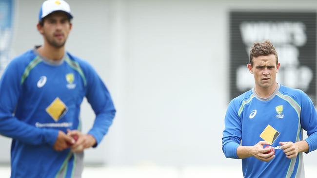 Ashton Agar and Steve O'Keefe prepare to bowl during an Australian training session. Picture: Getty Images