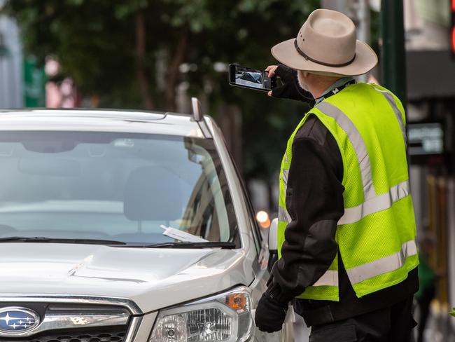 Queens street. City of Melbourne parking inspectors in the CBD. Picture: Jason Edwards