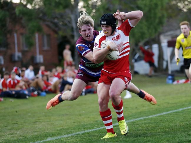 Jack Smith from Palm Beach and Corey Thomas from Wavell pictured in action during the Langer Cup schoolboys rugby league match between Wavell SHS and Palm Beach Currumbin, Brisbane 5th of August 2020.  (Image/Josh Woning)