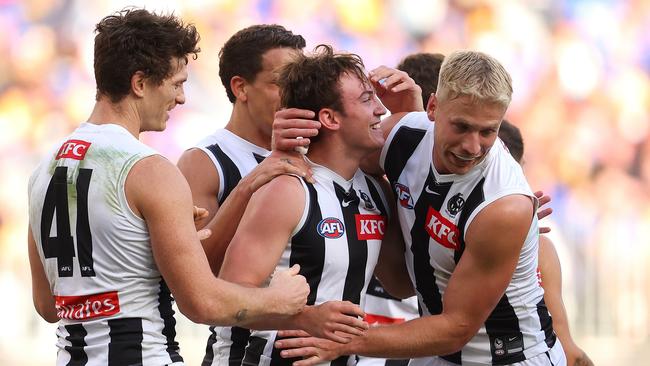 Harvey Harrison celebrates his first goal in the AFL. Picture: Paul Kane/Getty Images