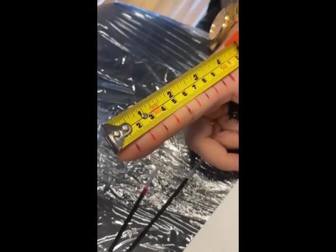 Tradie gets tattoo ruler on finger to help measure