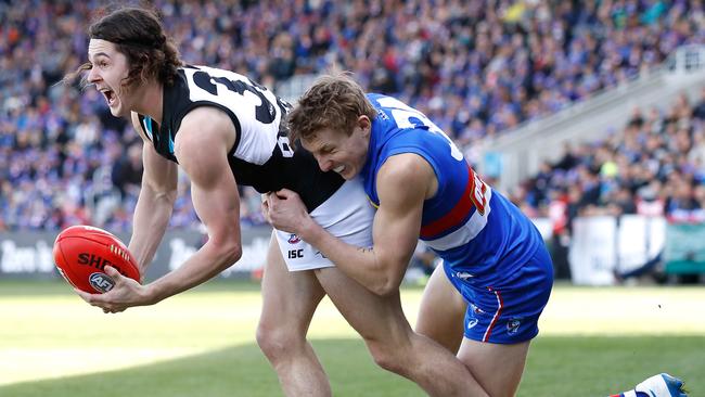 Darcy Byrne-Jones is tackled Bulldog Bailey Dale in Ballarat. Picture: Adam Trafford/Getty Images