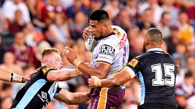 Payne Haas of the Broncos takes on the defence during the round 7 NRL match between the Brisbane Broncos and the Cronulla-Sutherland Sharks at Suncorp Stadium on April 27. (Photo by Bradley Kanaris/Getty Images)