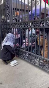 Protesters Pass Food Through Gates at Columbia University as Campus Limits Access