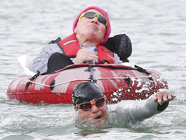 Kevin Ferguson and quadriplegic Sid James competing in the Victor Harbor Ironman.