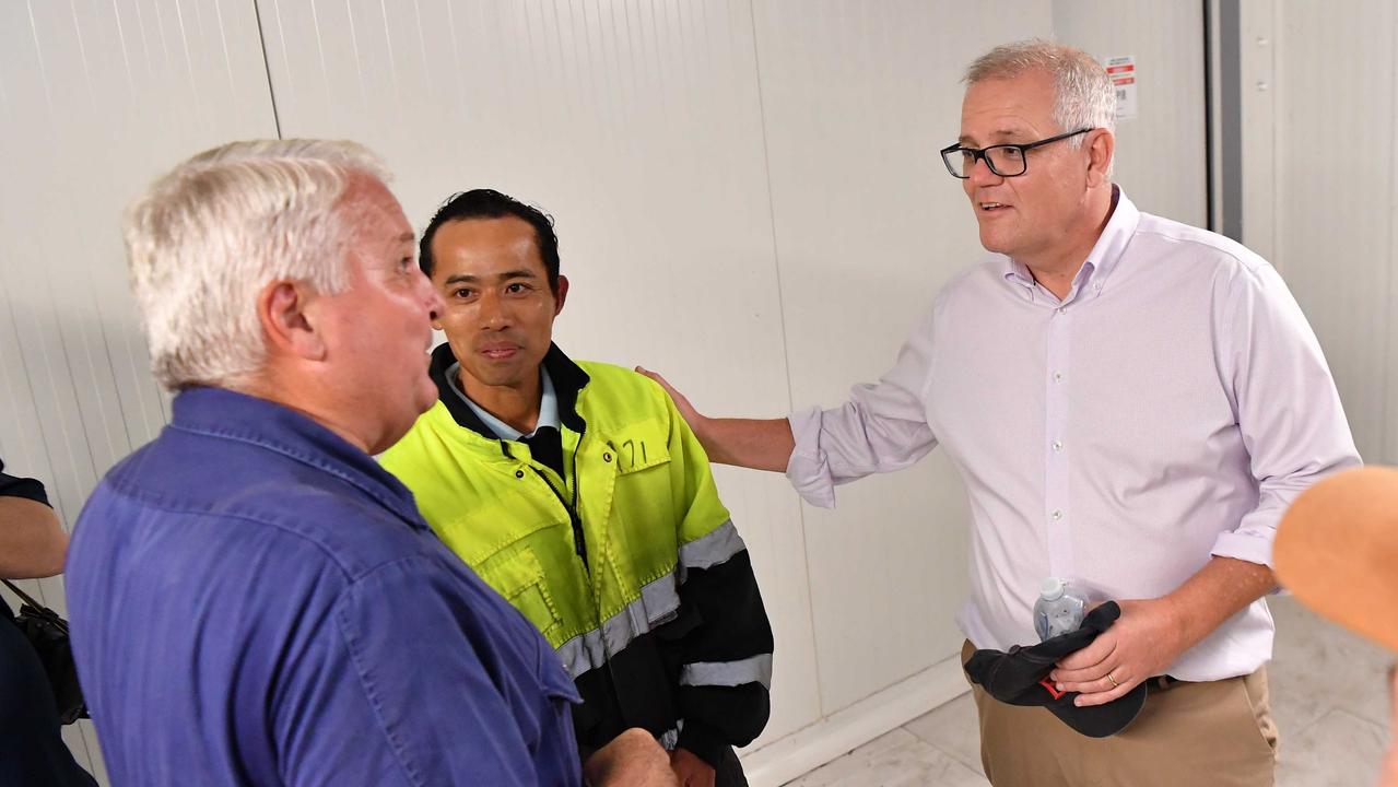 Prime Minster Scott Morrison visits Nolan Meats, Gympie, after devastating floods. Pictured with Terry Nolan. Photo: Patrick Woods.