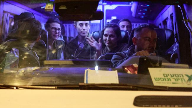 Newly release Israeli hostages arrive at Ofakim army base in southern Israel on Thurasday. Picture: AFP