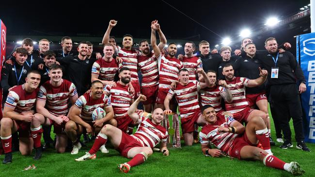 The Wigan Warriors celebrate winning the Super League final. (Photo by Alex Livesey/Getty Images)