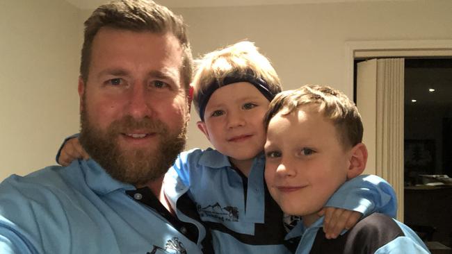 Damian Cavanagh with his children Archer and Hudson.