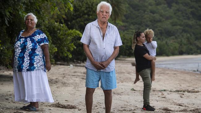 Alfie Neal, with daughter Josephine Murgha, left, and relatives Jirrin Gilmartin with Kane Murgha, 3, in Yarrabah, north of Cairns, on Thursday. Picture: Brian Cassey