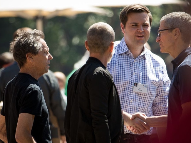 JD Vance shaking hands with Apple CEO Tim Cook in 2017 at Allen & Co.’s annual media and finance conference in Sun Valley, Idaho. Picture: Drew Angerer/Getty Images