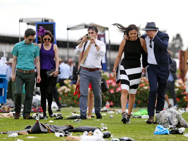 Melbourne Cup Day 2014 at Flemington Racecourse. Punters head home after the last race. Picture: Mark Stewart