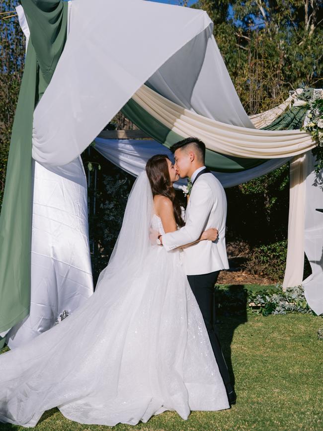 Josphanie and Matt at their garden ceremony. Picture: B Captured by Ky Luu.