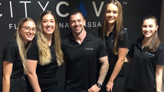 City Cave’s Damian Coppolecchia with his Springwood team.