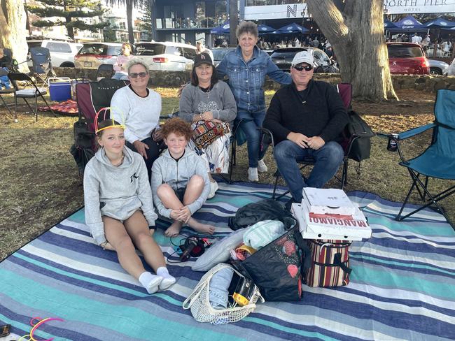 Ashleigh, Sharan Nachorny, Jaxon, Tracey Lieschke, Janice Williamson and Stephen Nachorny, from Albury Wodonga, celebrate New Year's Eve watching the fireworks at the Cowes Foreshore on Phillip Island. Picture: Jack Colantuono