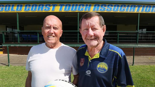 Gold Coast Touch Football stalwarts Henry Lesniewski and Paul Eggers( white) remember fifty years of the sport at Owen Park Southport. Picture Glenn Hampson