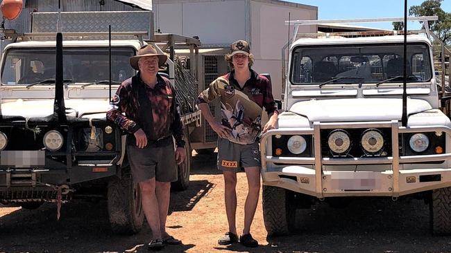 David Booth, 19, (right) with his father and their beloved Landrover utes. Picture: Supplied