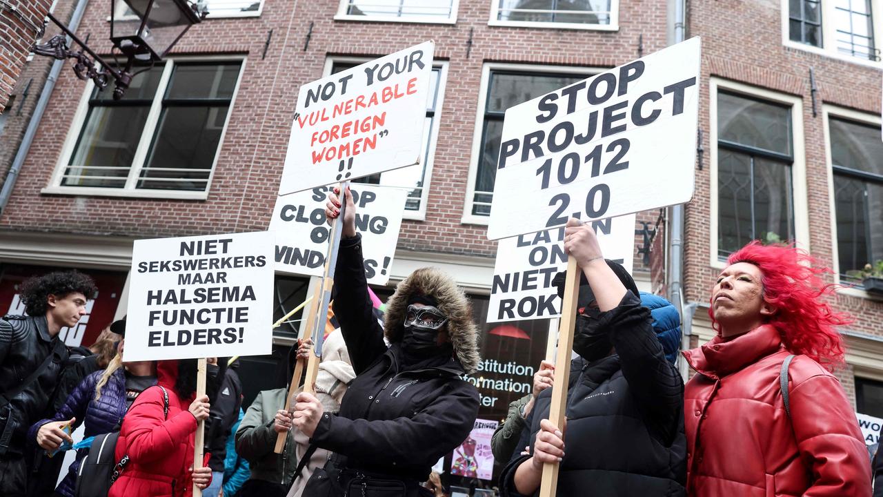 Sex workers and sympathisers take part in a demonstration to protest plans to shutter Amsterdam’s historic red light district. Picture: Kenzo Tribouillard/AFP