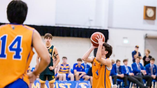 AIC Basketball action: Ashgrove's Matt Gibson at the penalty stripe. Picture courtesy of Denver Jensen.