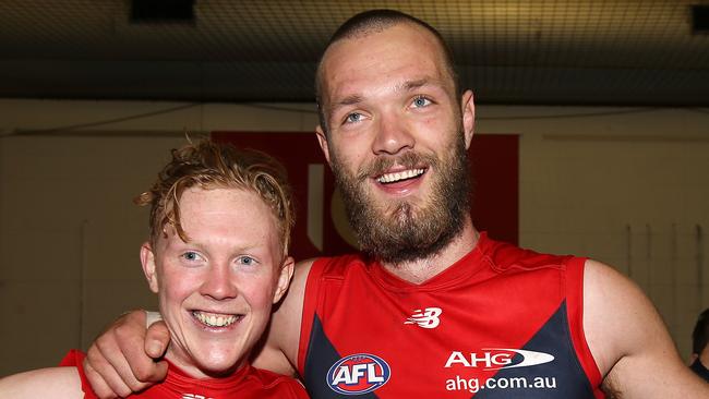 Clayton Oliver and Melbourne's Max Gawn. Pic: Michael Klein