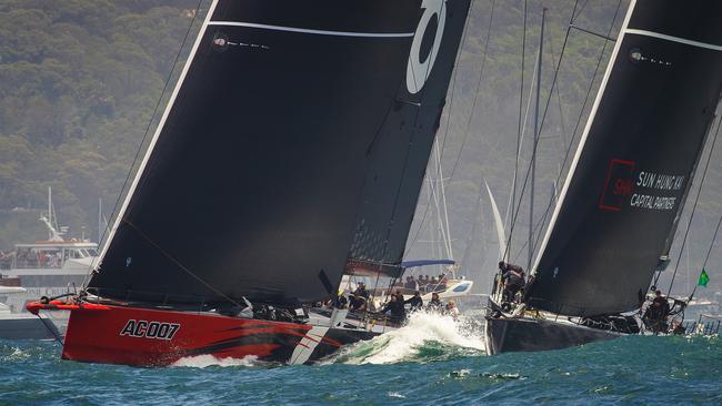 Comanche, left, and Scallywag have a close encounter shortly after the start of the Sydney Hobart race. Picture: Corbis via Getty Images