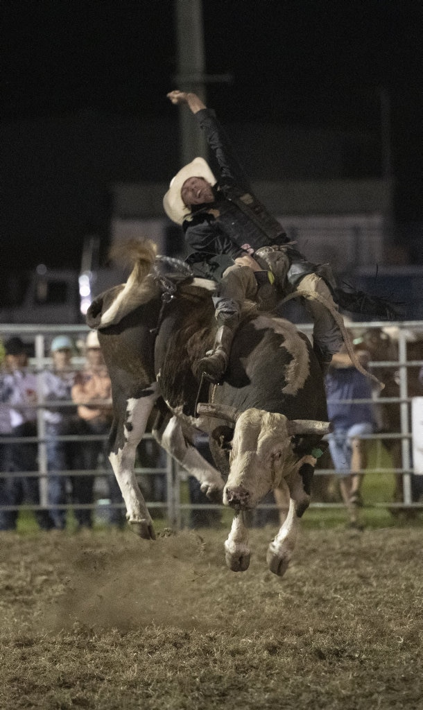 Clint Glass rides in the top eight chute out at the Lawrence Twilight Rodeo. Picture: Adam Hourigan