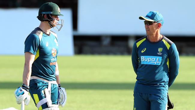 Australian coach Justin Langer says Steve Smith (left) could be considered for a vice- captaincy role once his leadership ban expires. Picture: AAP