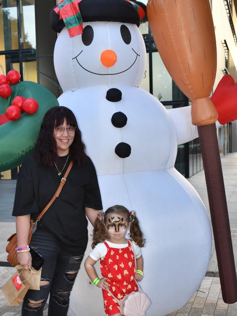 Helena Knight and Ava-Boston Knight-Weir at the CBD Christmas Fair in Rockhampton on December 3, 2022.