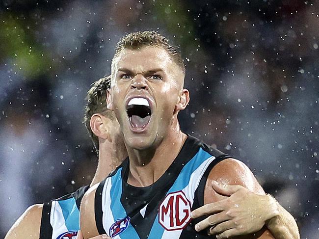 Port Adelaide's Dan Houston celebrates kicking a goal  during the AFL Gather Round match between Port Adelaide and the Western Bulldogs at the Adelaide Oval on April 15, 2023.  Photo by Phil Hillyard(Image Supplied for Editorial Use only - **NO ON SALES** - Â©Phil Hillyard )