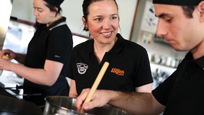 Teacher Siarn White (centre) shares her skills with Year 12 students Jacinta Dawson and Joshua Summers. Pictures: Angelo Velardo