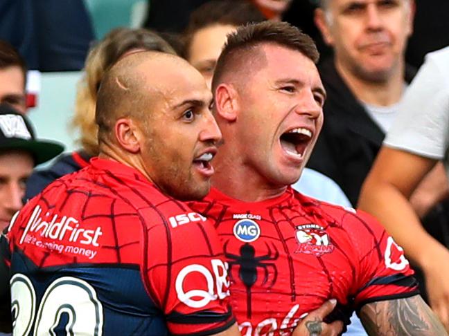 Roosters Shaun Kenny-Dowall  celebrates scoring a try during the round 5 NRL game between the Sydney Roosters and the Canterbury Bulldogs at Allianz Stadium , Moore Park . Picture : Gregg Porteous