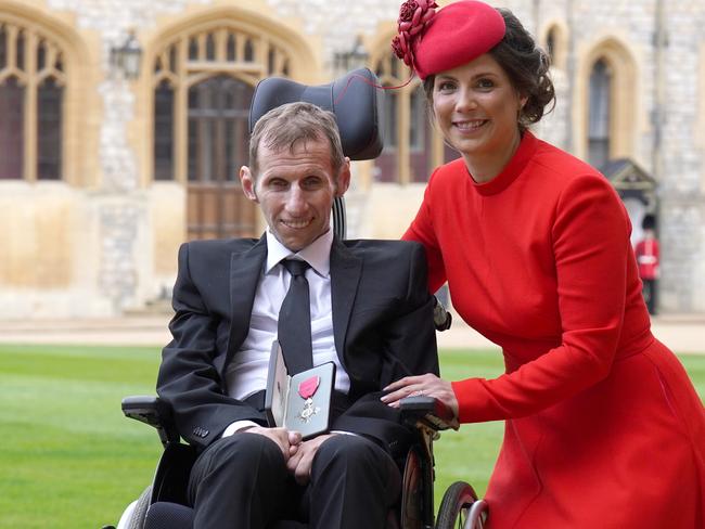 Rob Burrow with his wife Lindsey after he was made an MBE during an investiture ceremony at Windsor Castle on April 5, 2022. Picture: Getty Images