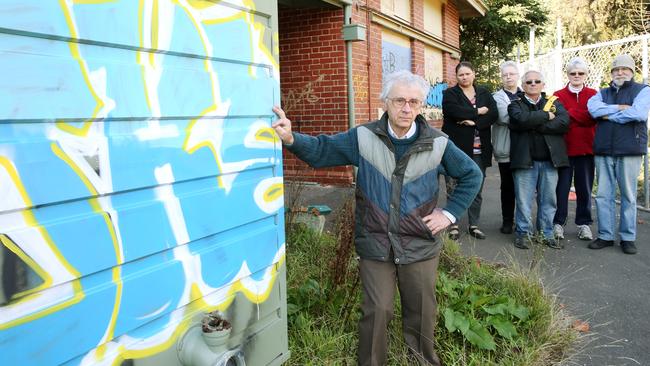 Nunawading Primary School Site Preservation Group president Michael Challinger and fellow members at the former school site which has been vandalised. Picture: Janine Eastgate.